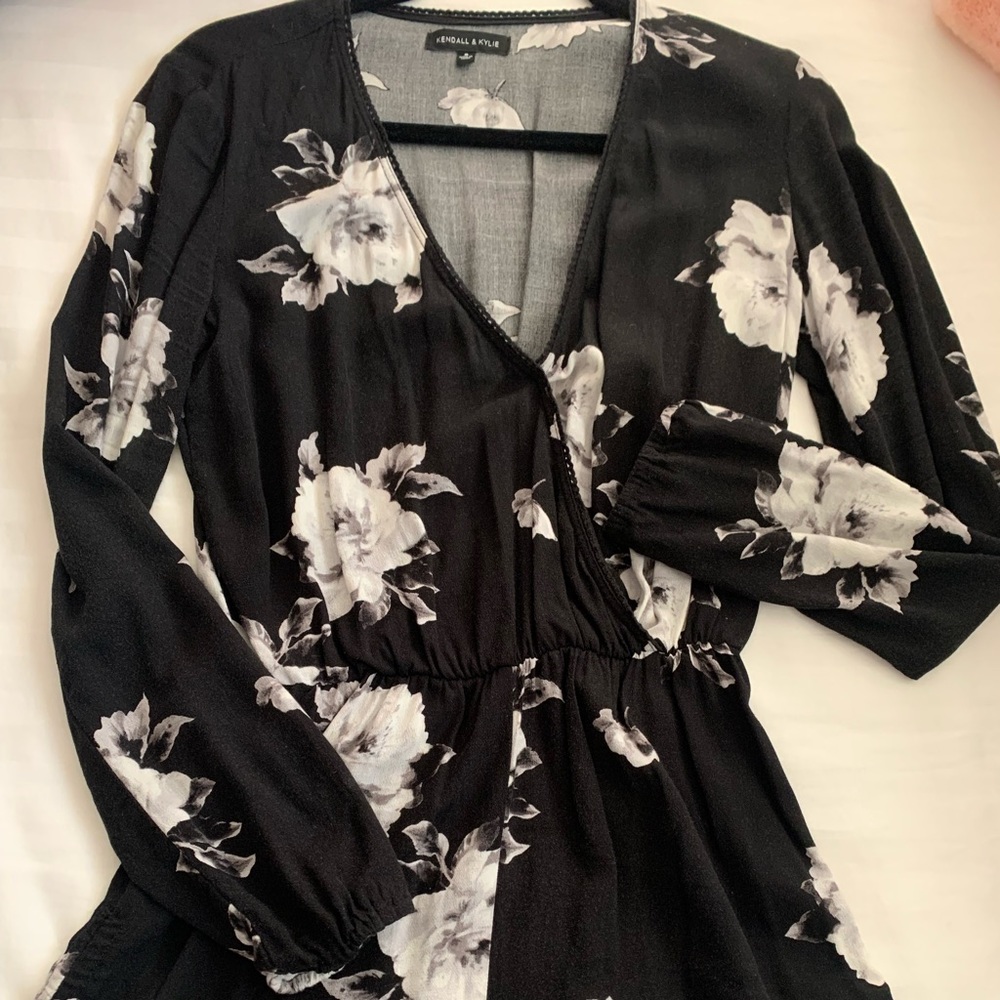 Kendall and Kylie long sleeve romper with flower detailing.